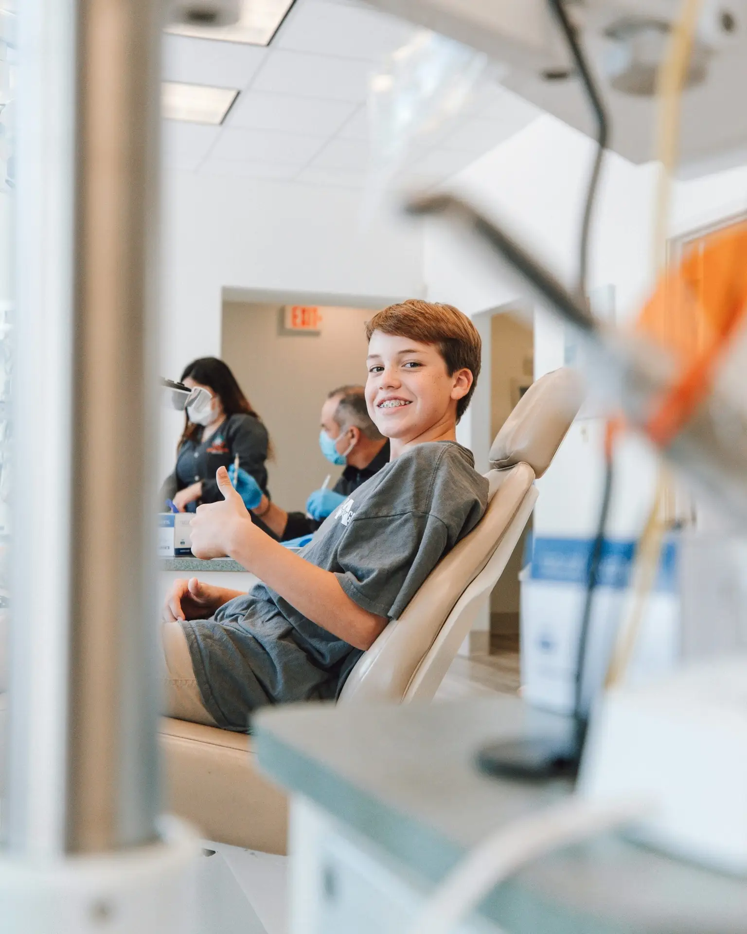 Teen orthodontic patient smiling during an expansion appointment at Zakhar Orthodontics in Ridgeland, SC.